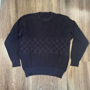 Vintage 1990s Fila navy checkered sweater with ribbed details.